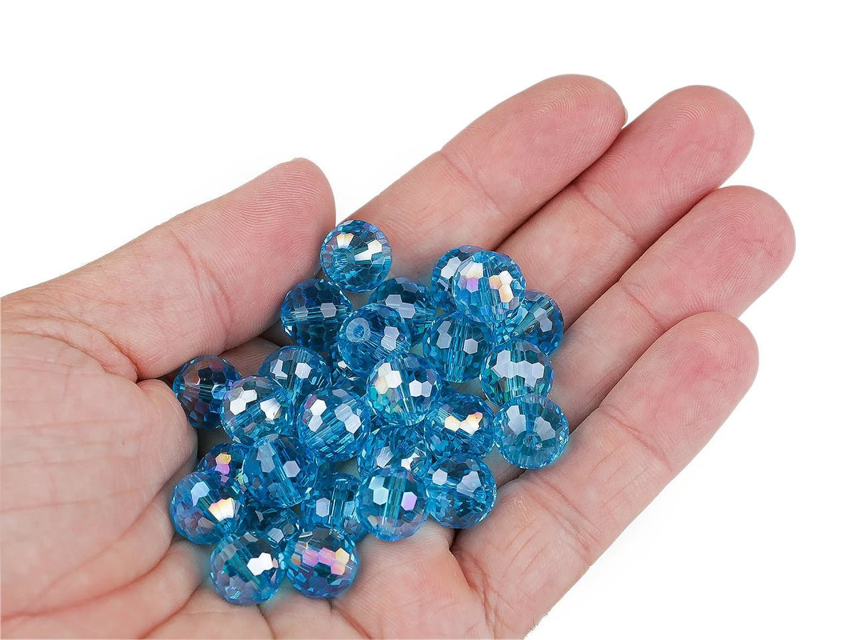 Image de perles en verre facettées avec effet AB – 12 mm, 30 pcs – disponible en ligne chez Šarlotes audumi