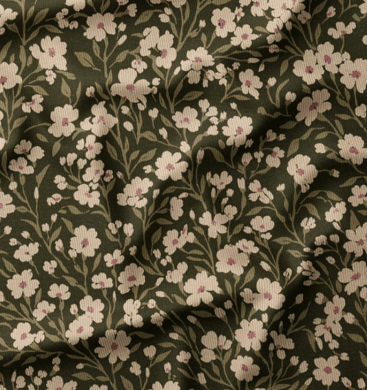 Image avec fleurs fines en velours côtelé de coton sur fond vert – disponible en ligne chez Šarlotes audumi