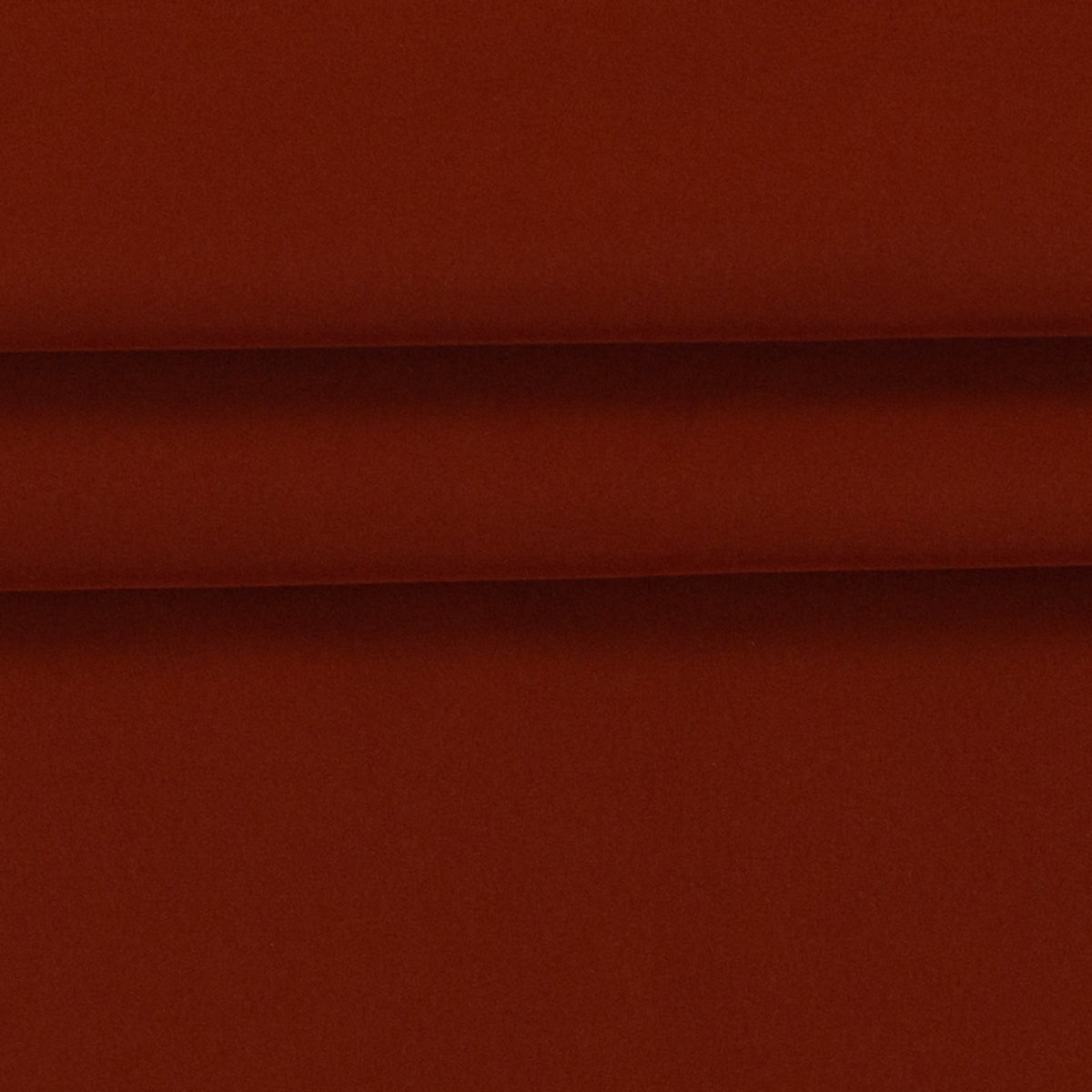 Image de tissu softshell imperméable rouge brique – disponible en ligne chez Šarlotes audumi