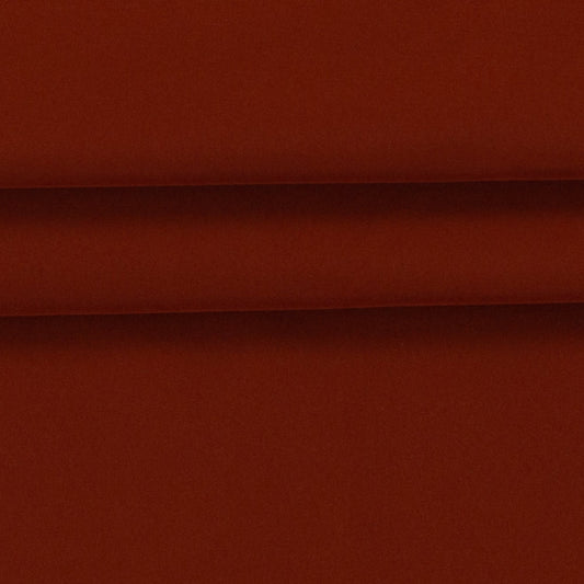 Image de tissu softshell imperméable rouge brique – disponible en ligne chez Šarlotes audumi