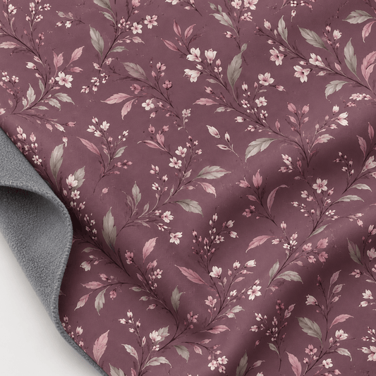 Image de tissu softshell à motif floral sur fond vieux rose – disponible en ligne chez Šarlotes audumi