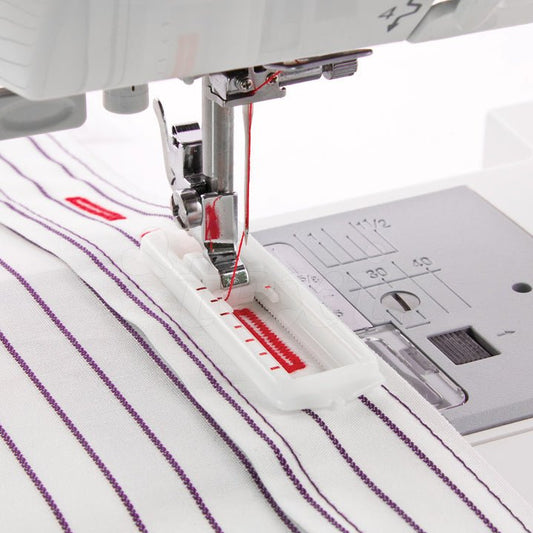 Sewing machine foot for making buttonholes