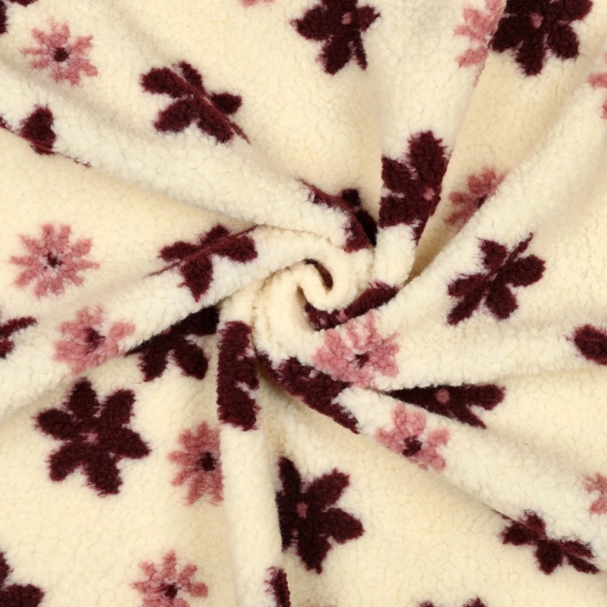 Image de fleurs en polaire Teddy sur fond clair – disponible en ligne chez Šarlotes audumi