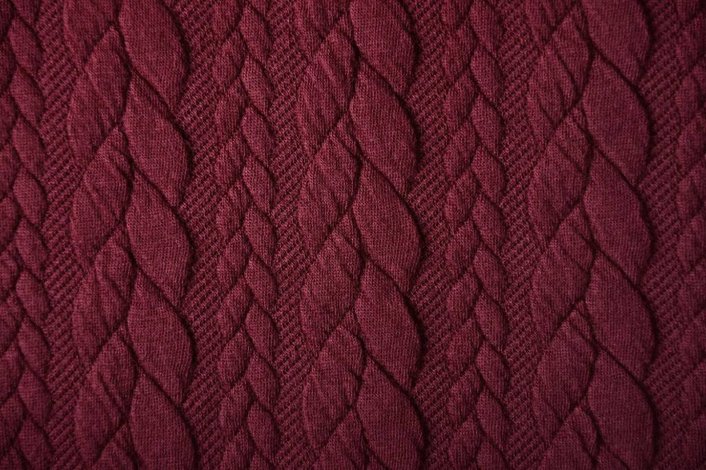 Image of knitted fabric with a knit pattern - burgundy cables 340 g/m² – available at Charlotte's fabrics