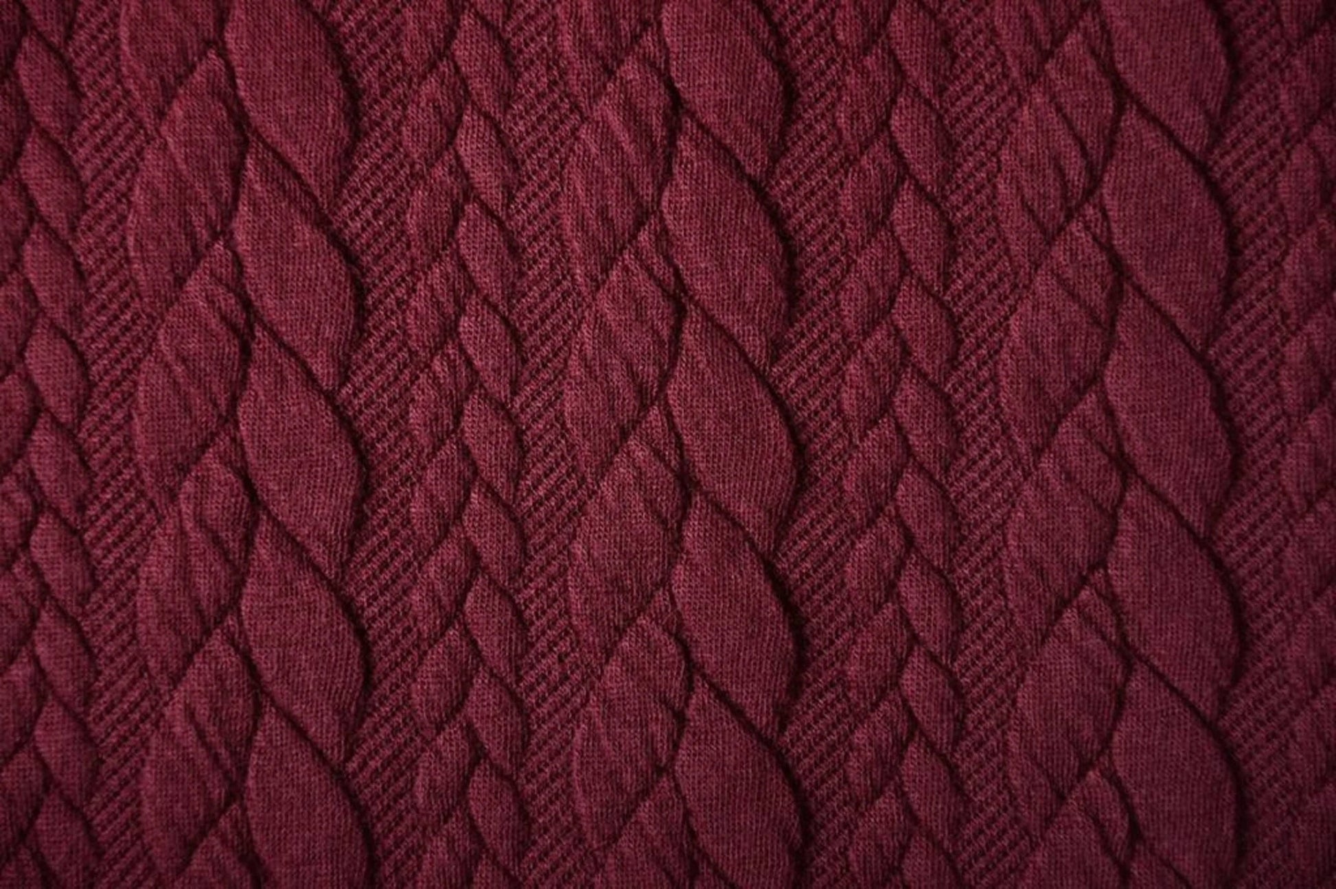 Image of knitted fabric with a knit pattern - burgundy cables 340 g/m² – available at Charlotte's fabrics
