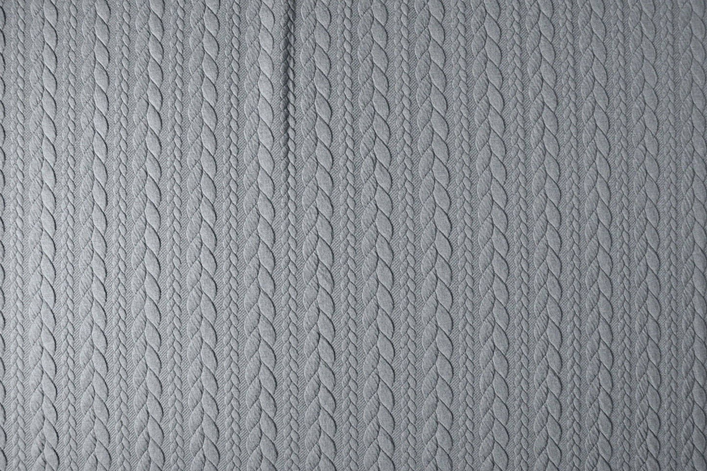 Image with knitted fabric with a knitted pattern - gray braids 340 g/m² – available at Šarlotes audumi