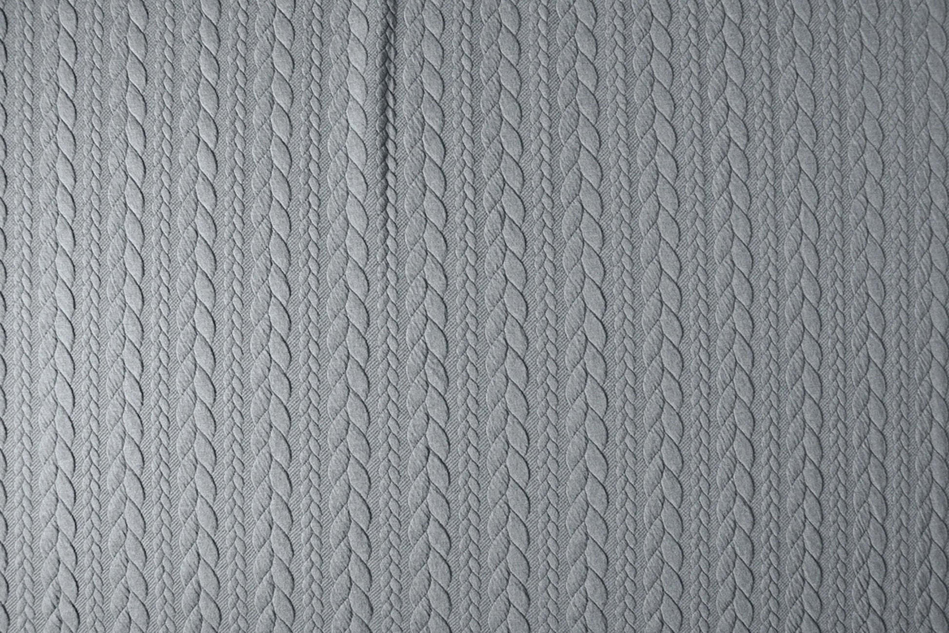 Image with knitted fabric with a knitted pattern - gray braids 340 g/m² – available at Šarlotes audumi