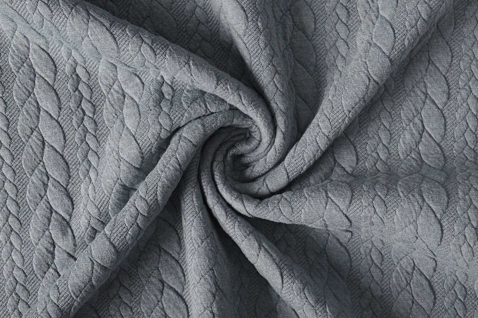 Image with knitted fabric with a knit pattern - gray braids 340 g/m² – available at Charlotte Fabrics