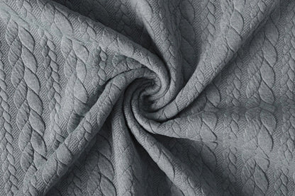 Image with knitted fabric with a knit pattern - gray braids 340 g/m² – available at Charlotte Fabrics
