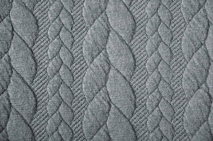 Image with knitted fabric with a knit pattern - gray braids 340 g/m² – available at Šarlotes audumi