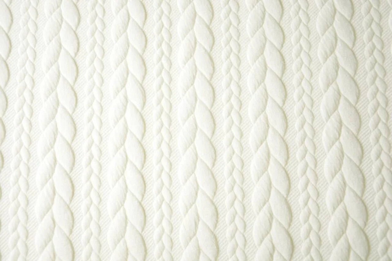 Image of knitted fabric with a knit pattern, warm white – available online at Šarlotes audumi