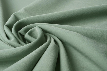Tissu de costume en viscose avec élasthanne - menthe 275 g/m²