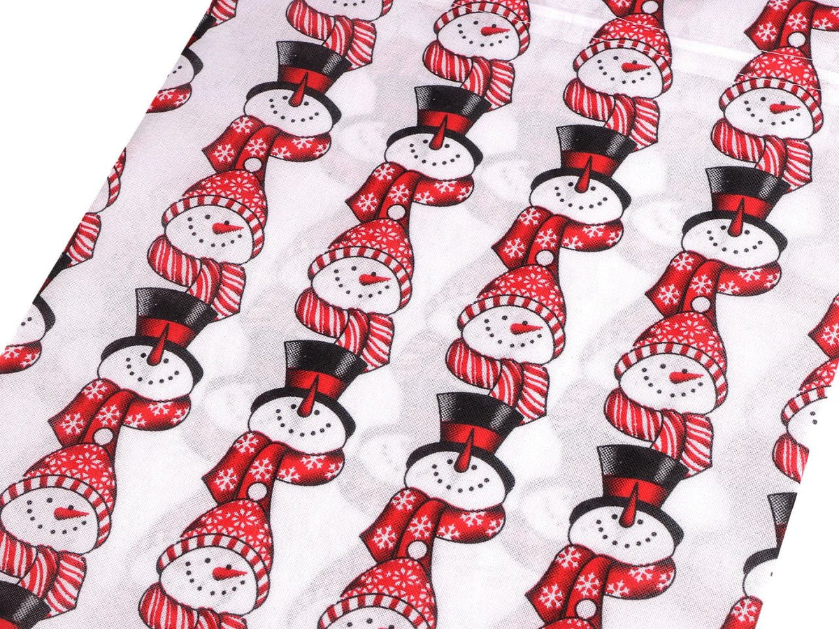 Image avec sac cadeau de Noël avec bonhomme de neige 30 × 40 cm – disponible en ligne chez les tissus de Charlotte