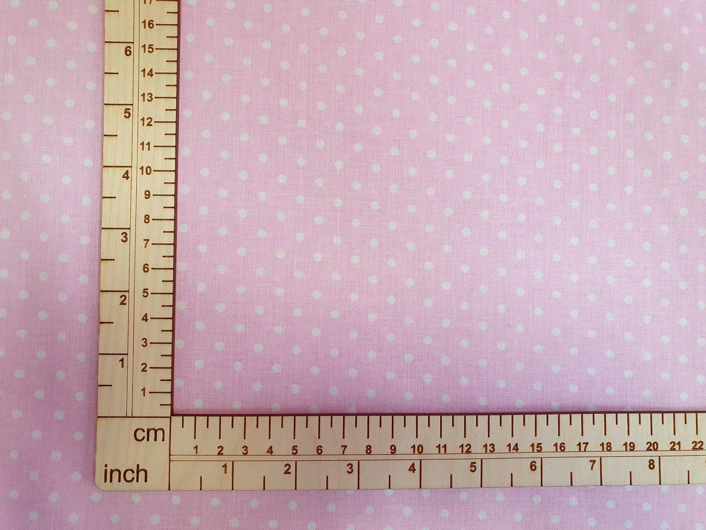 100% Cotton fabric - white polka dots on a pink background (4 mm) 130 g/m²
