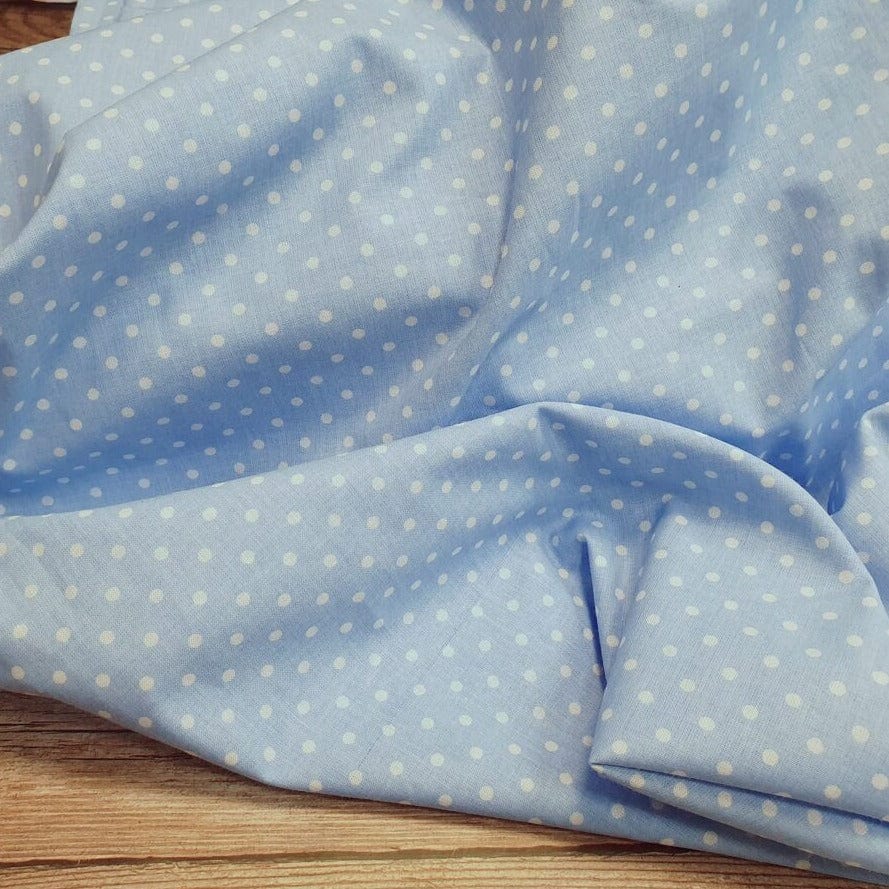 100% Cotton fabric - white polka dots on a blue background (4 mm) 130 g/m²