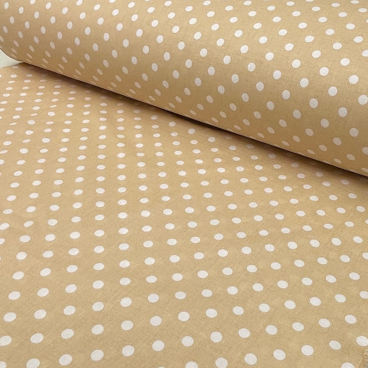 100% cotton fabric with pom-poms on a soft yellow background 125 g/m²