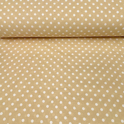 100% cotton fabric with polka dots on a soft yellow background 125 g/m²