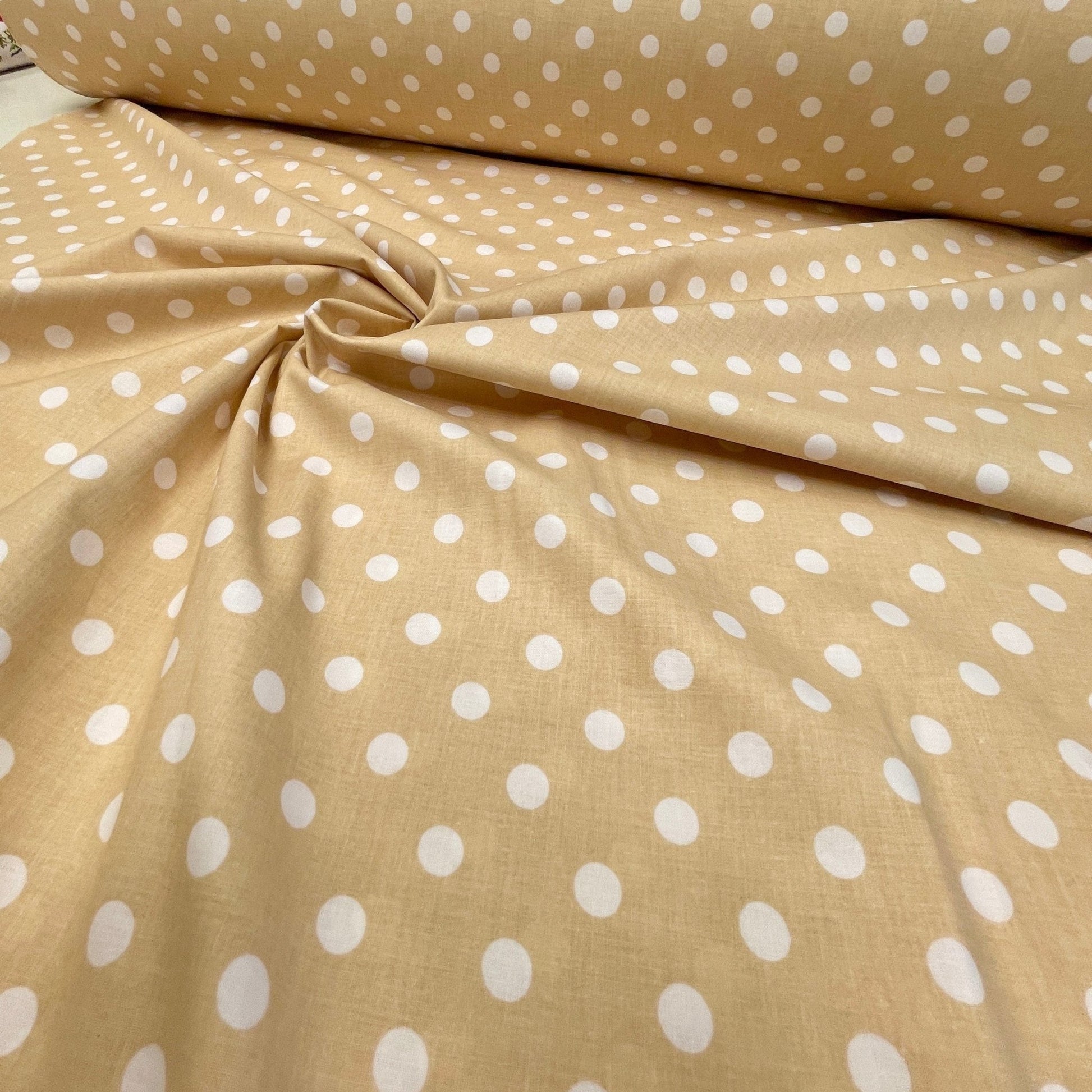 100% Cotton fabric - pom-poms on a soft yellow background 125 g/m²