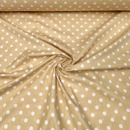 100% Cotton fabric - pompoms on a soft yellow background 125 g/m²