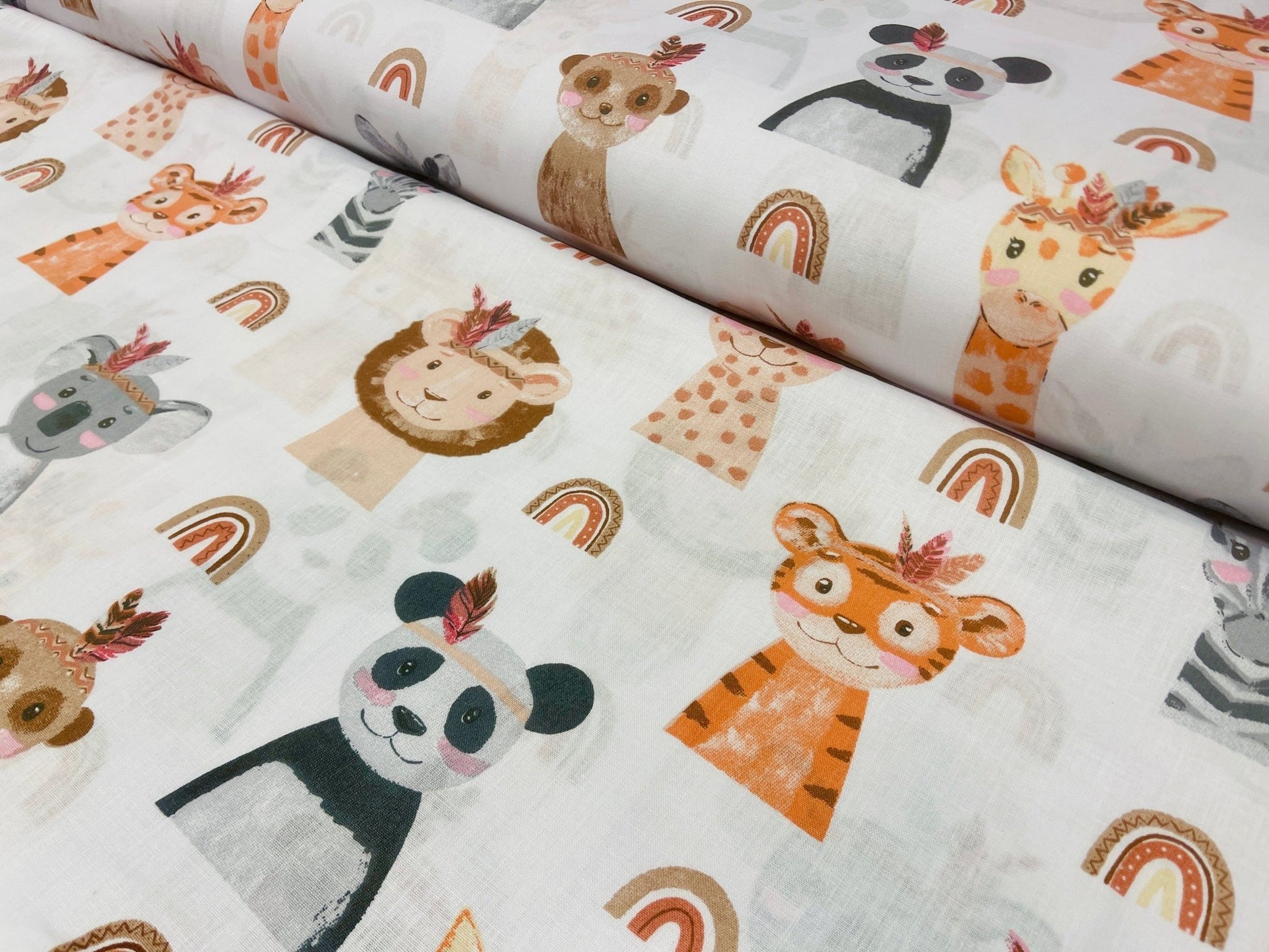 100% cotton fabric with animal faces 125 g/m²