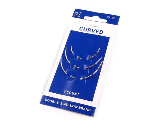 Curved upholstery and darning needles