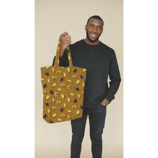 Canvas fabric with avocados on a dark yellow background 225 g/m²