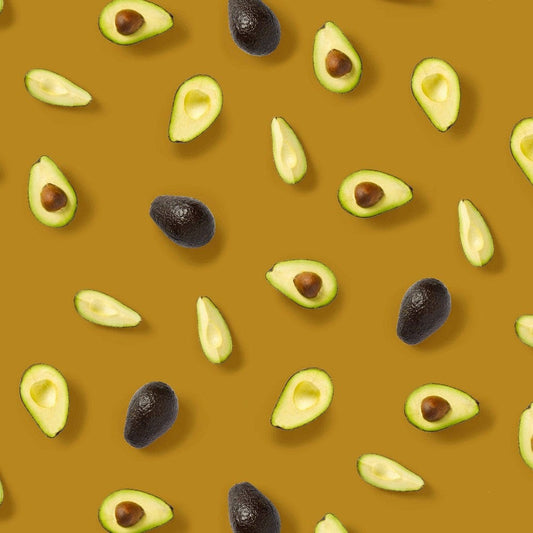 canvas fabric - avocado on a dark yellow background 225 g/m²