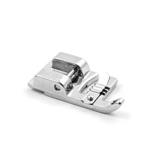 Sewing machine presser foot for sewing decorative ribbons and cords