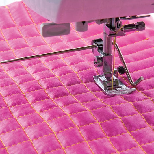 Sewing machine guide for quilting and topstitching
