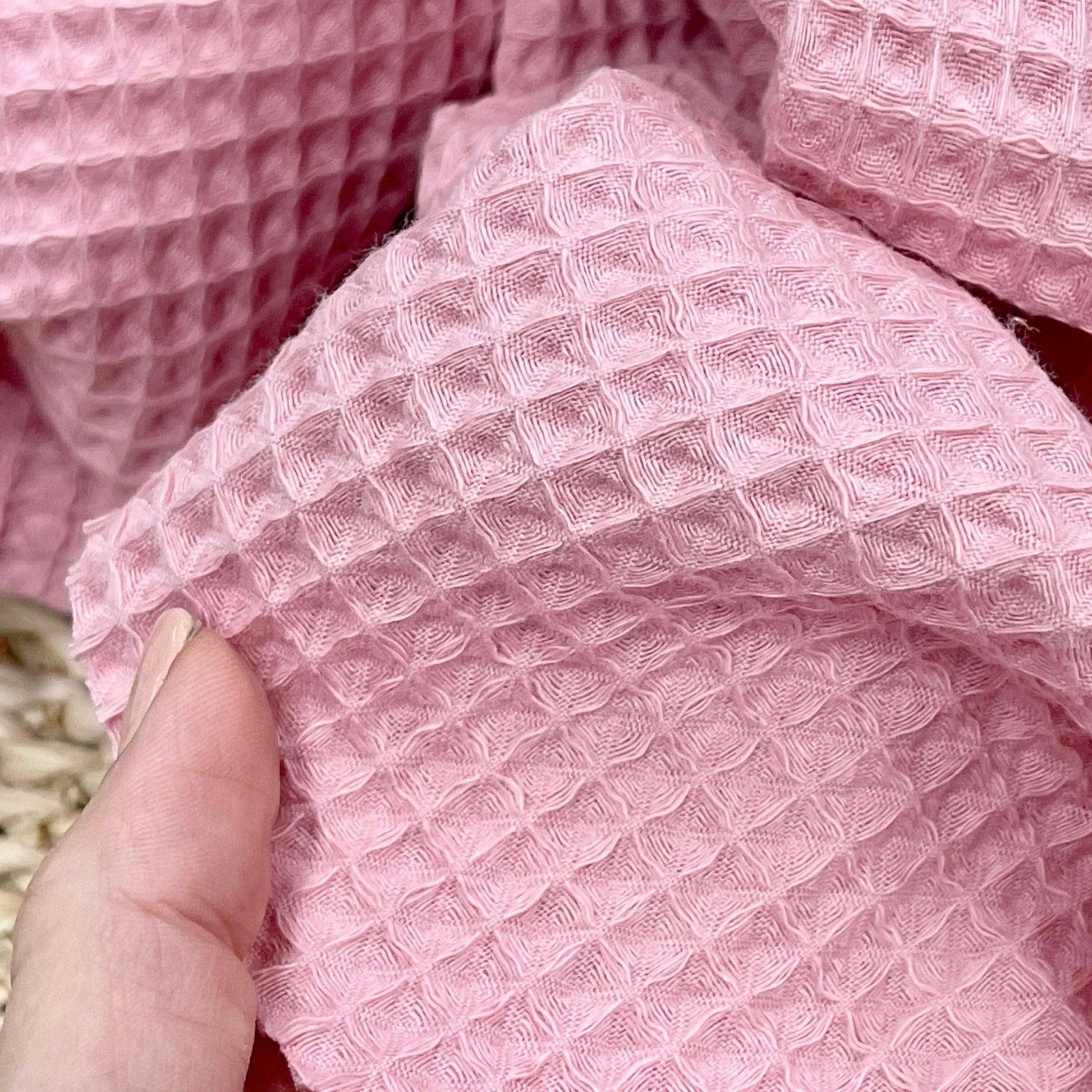 Tissu gaufré rose 230 g/m²