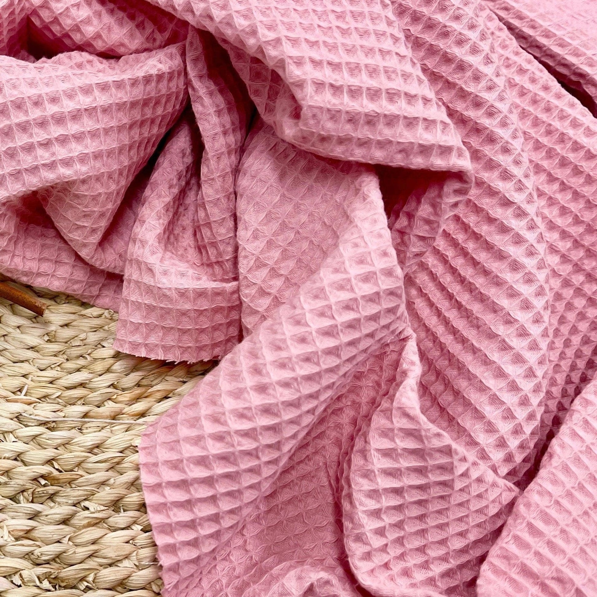 Tissu gaufré rose 230 g/m²